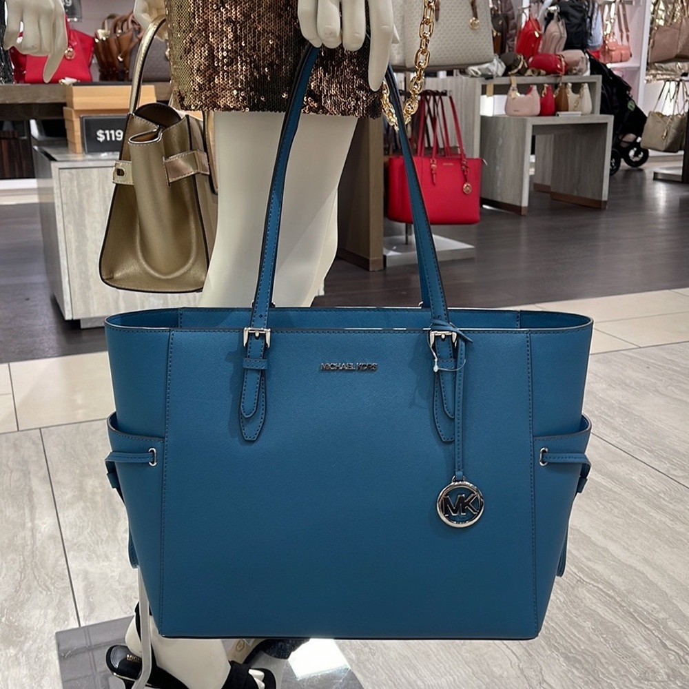 Michael Kors Gilly Large Drawstring Travel Leather Top Zip Tote
 Color: TEAL
NWT